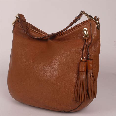 michael michael kors brown leather braided handle and tassel bag|michael kors handbags brown thomas.